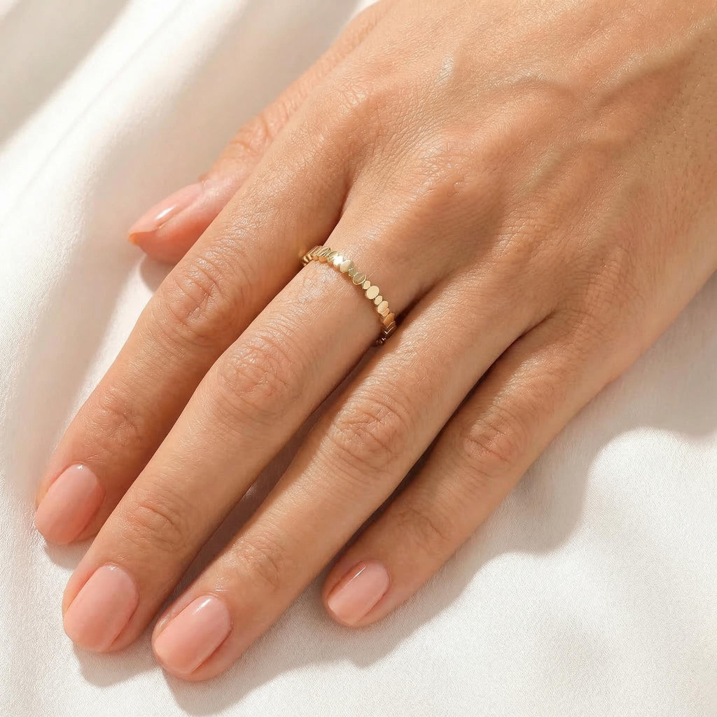 Gold beaded band worn every day