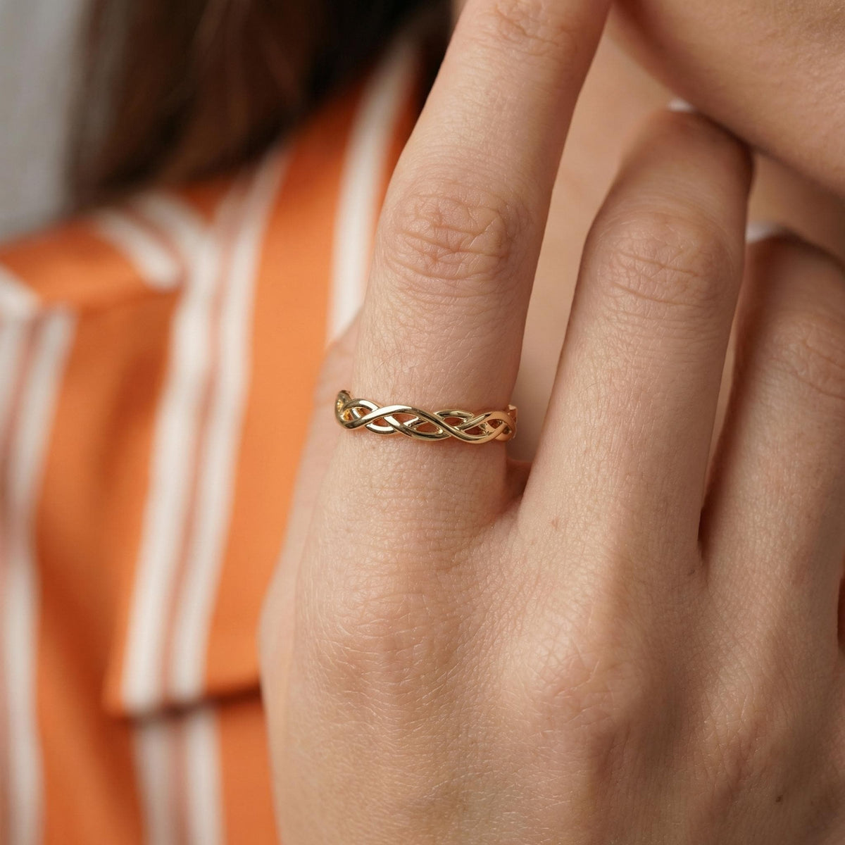 Celtic knot ring worn on hand