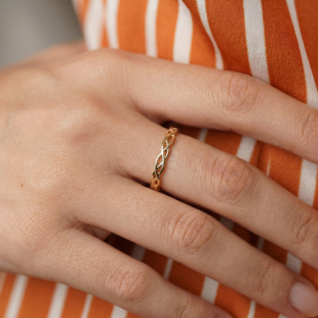 Gold Celtic knot stacking ring worn