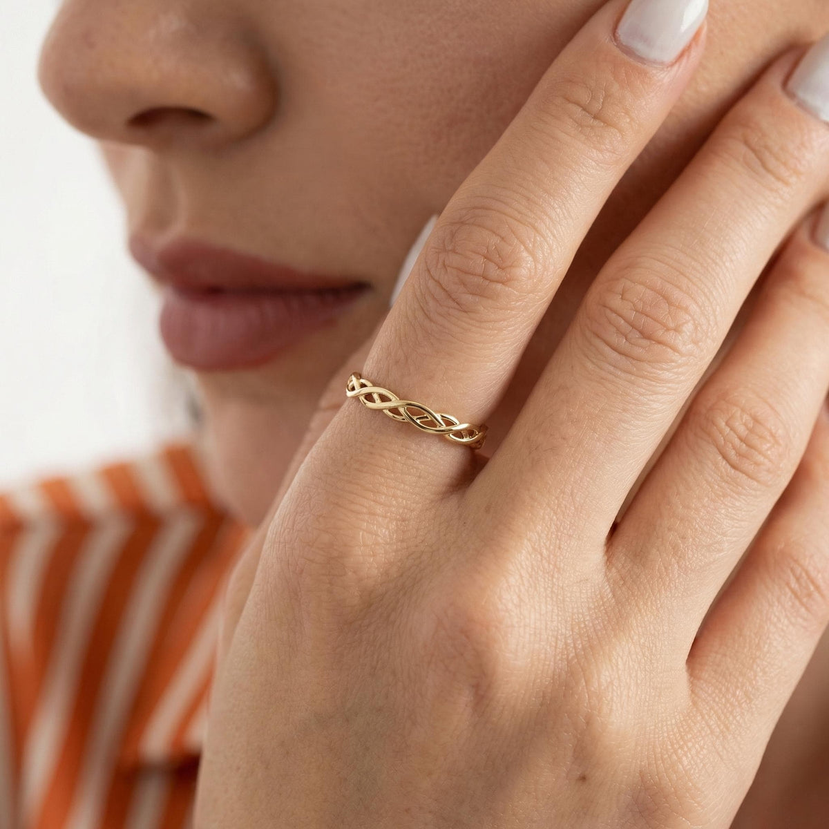 Celtic knot ring worn near face