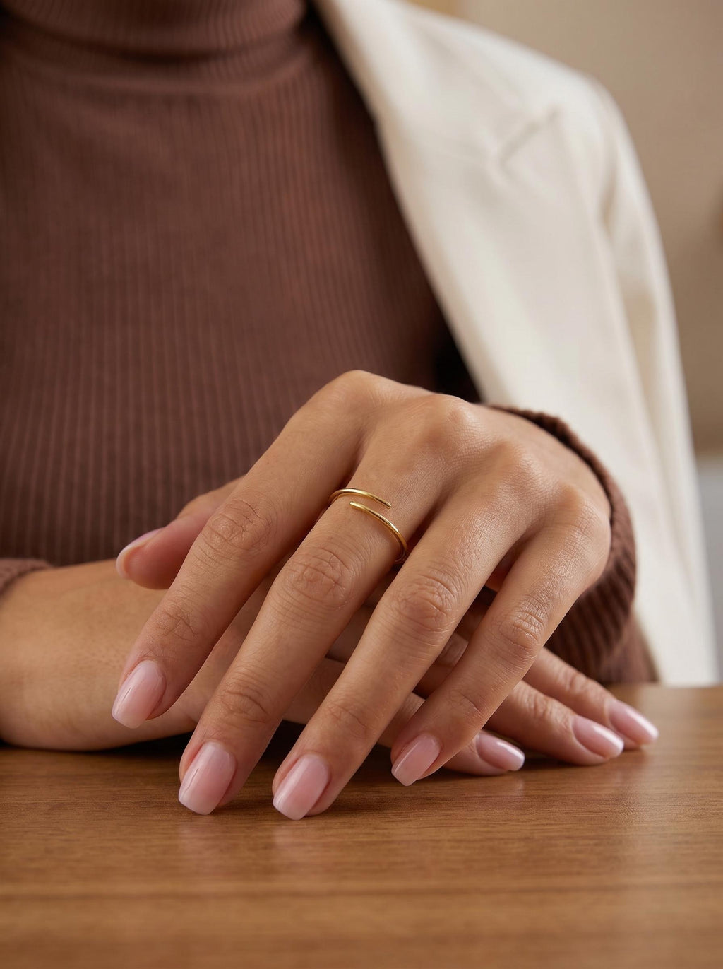 Criss cross ring worn on the hand