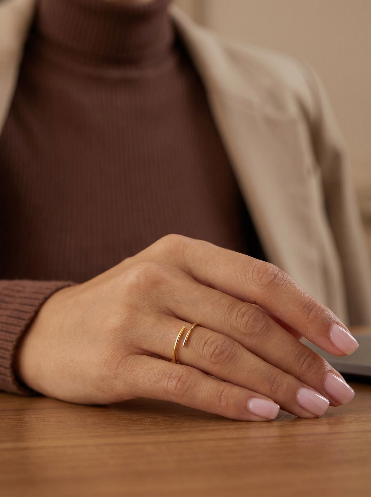 Minimalist X band ring on model
