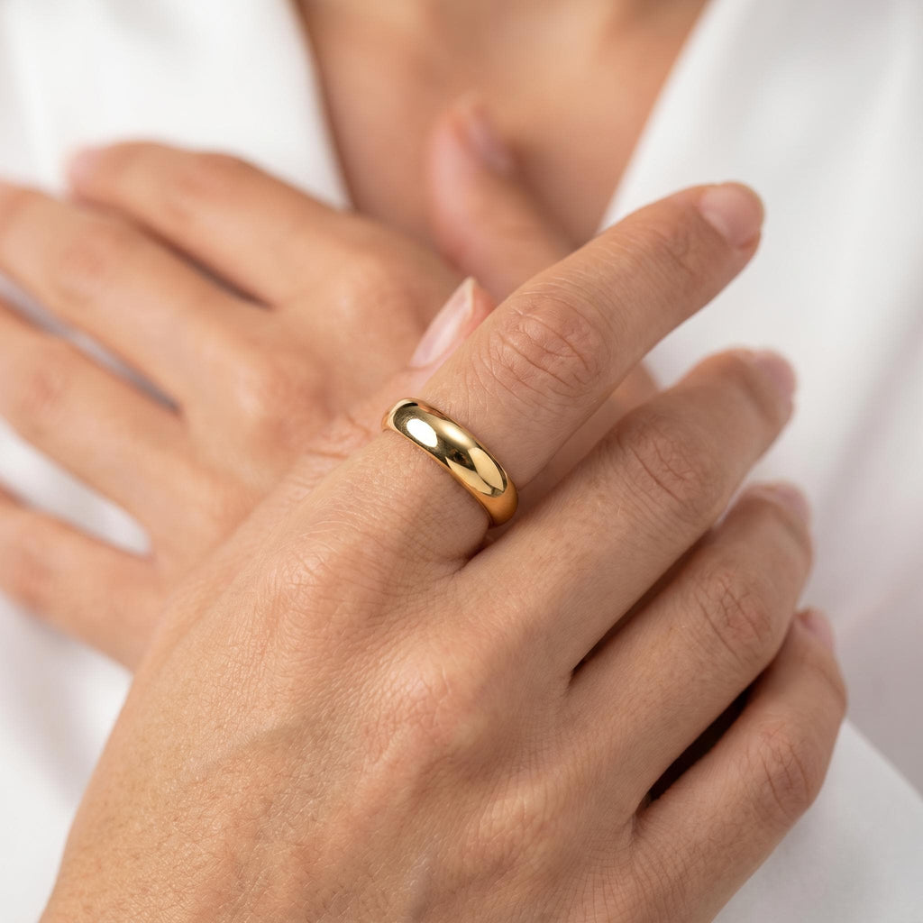 Dome band on a woman's hand