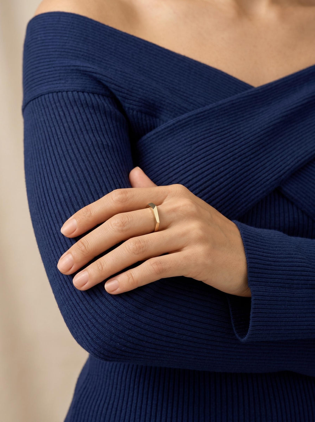 Geometric gold ring worn