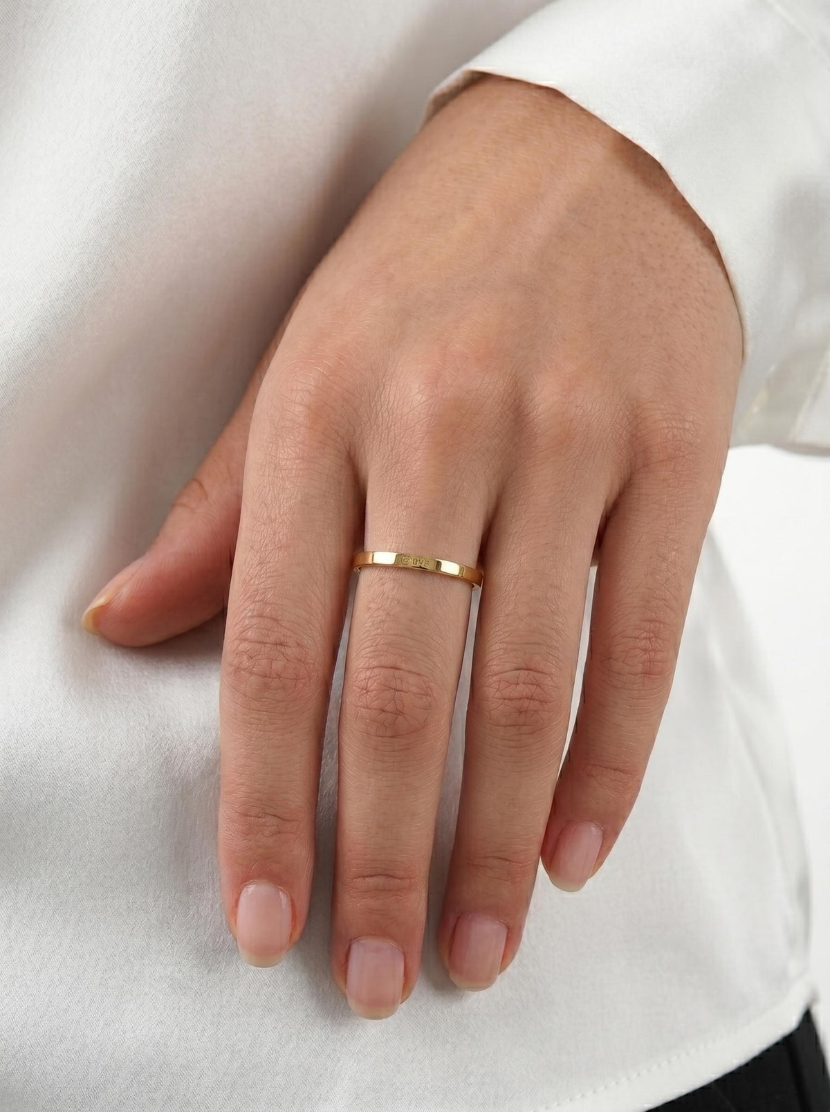 Dainty gold wedding band worn every day
