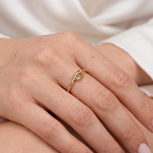 Love knot ring worn on the finger