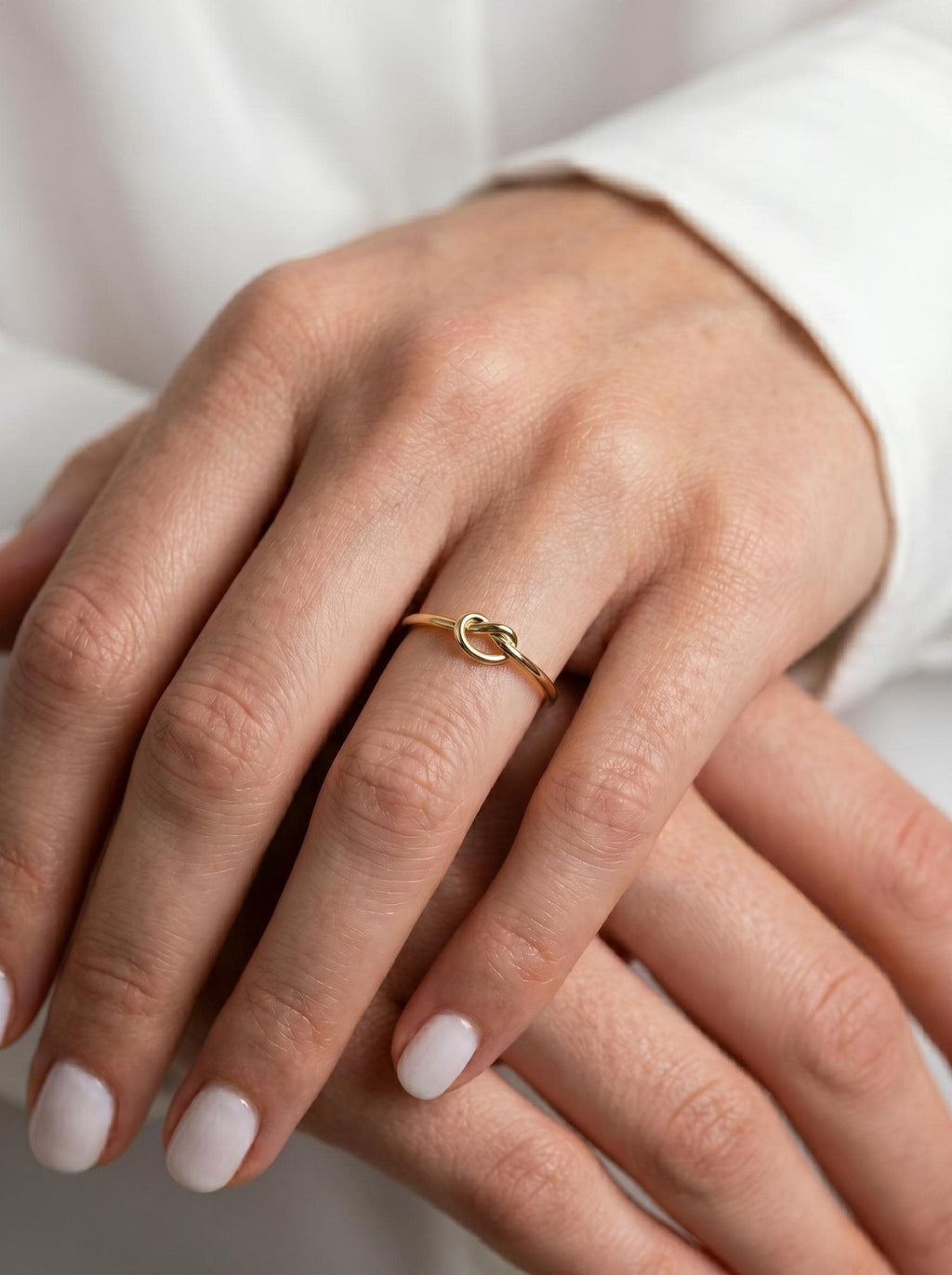 Gold knot ring worn as an everyday ring