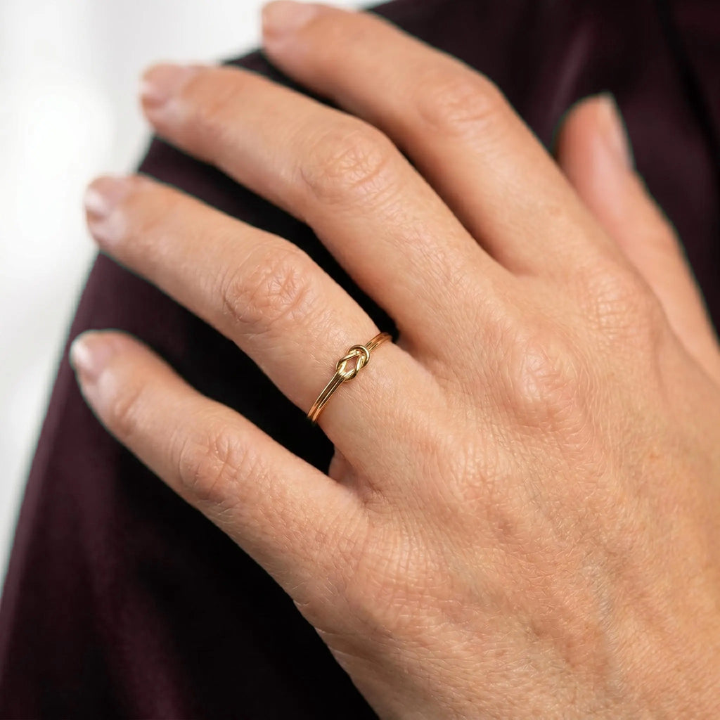 Tiny knot ring worn every day