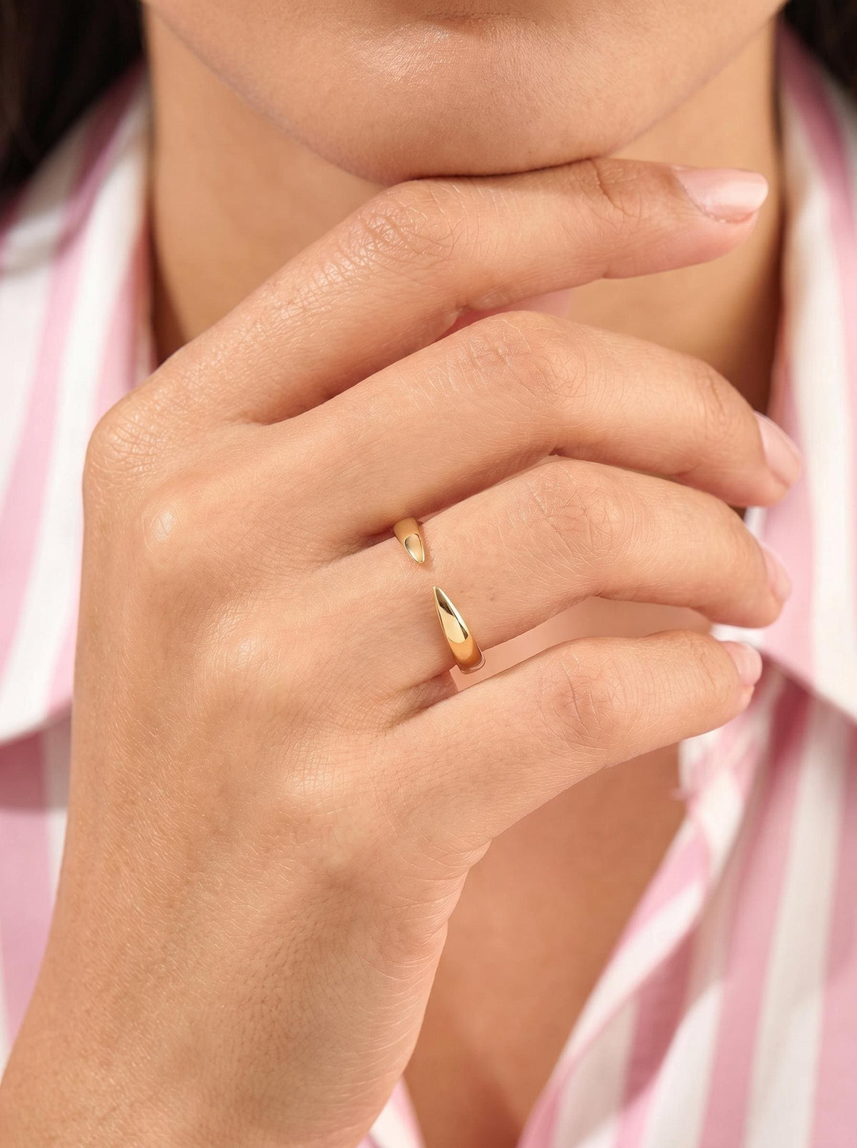 Open cuff ring worn on the hand