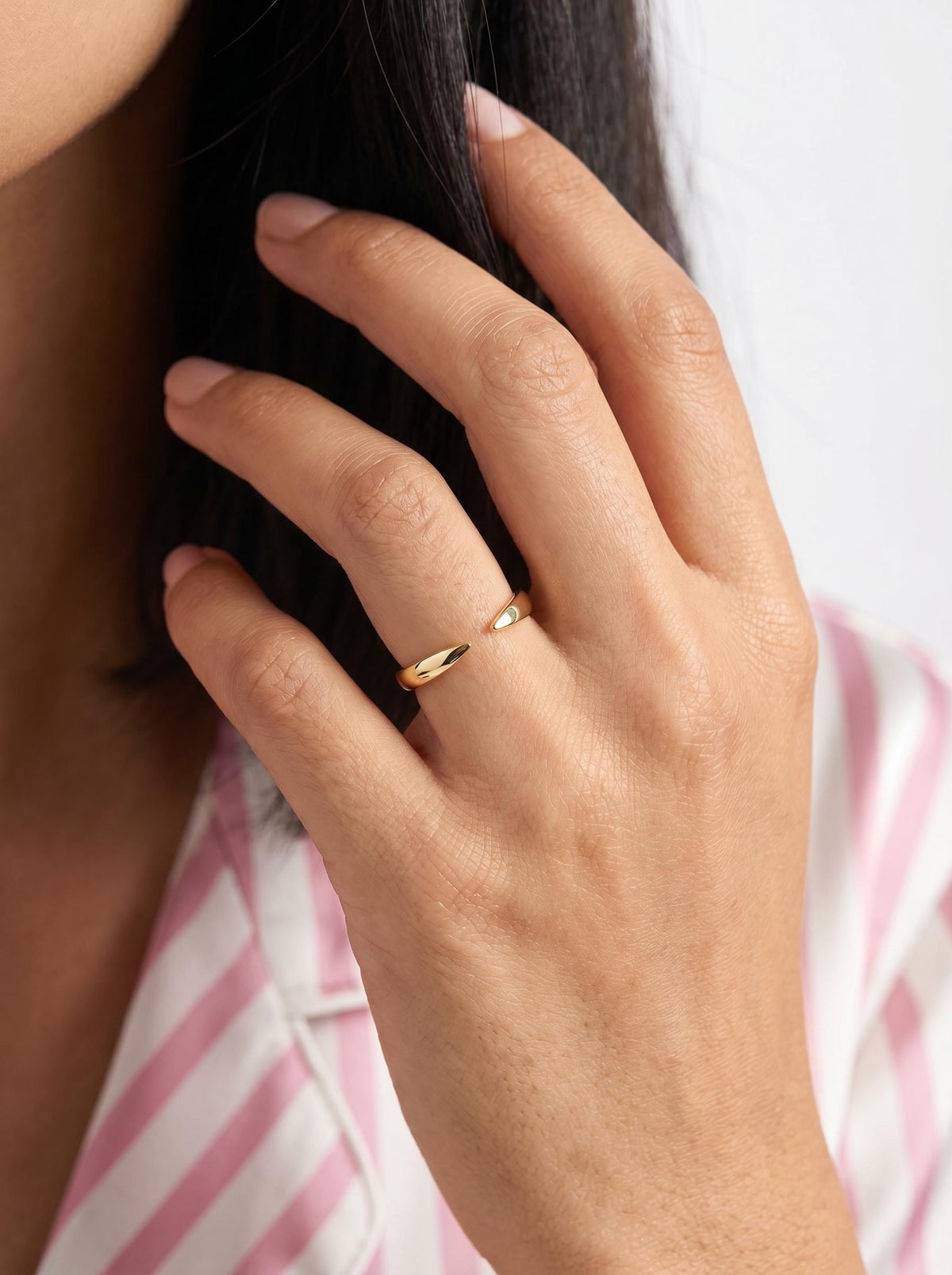 Model wearing the open cuff ring