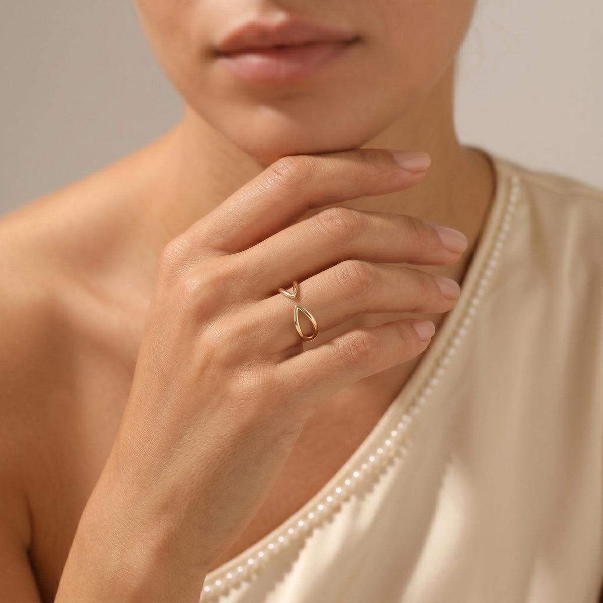 Model wearing the gold open ring
