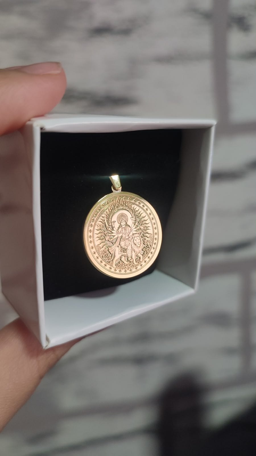 Goddess Durga medallion in gold