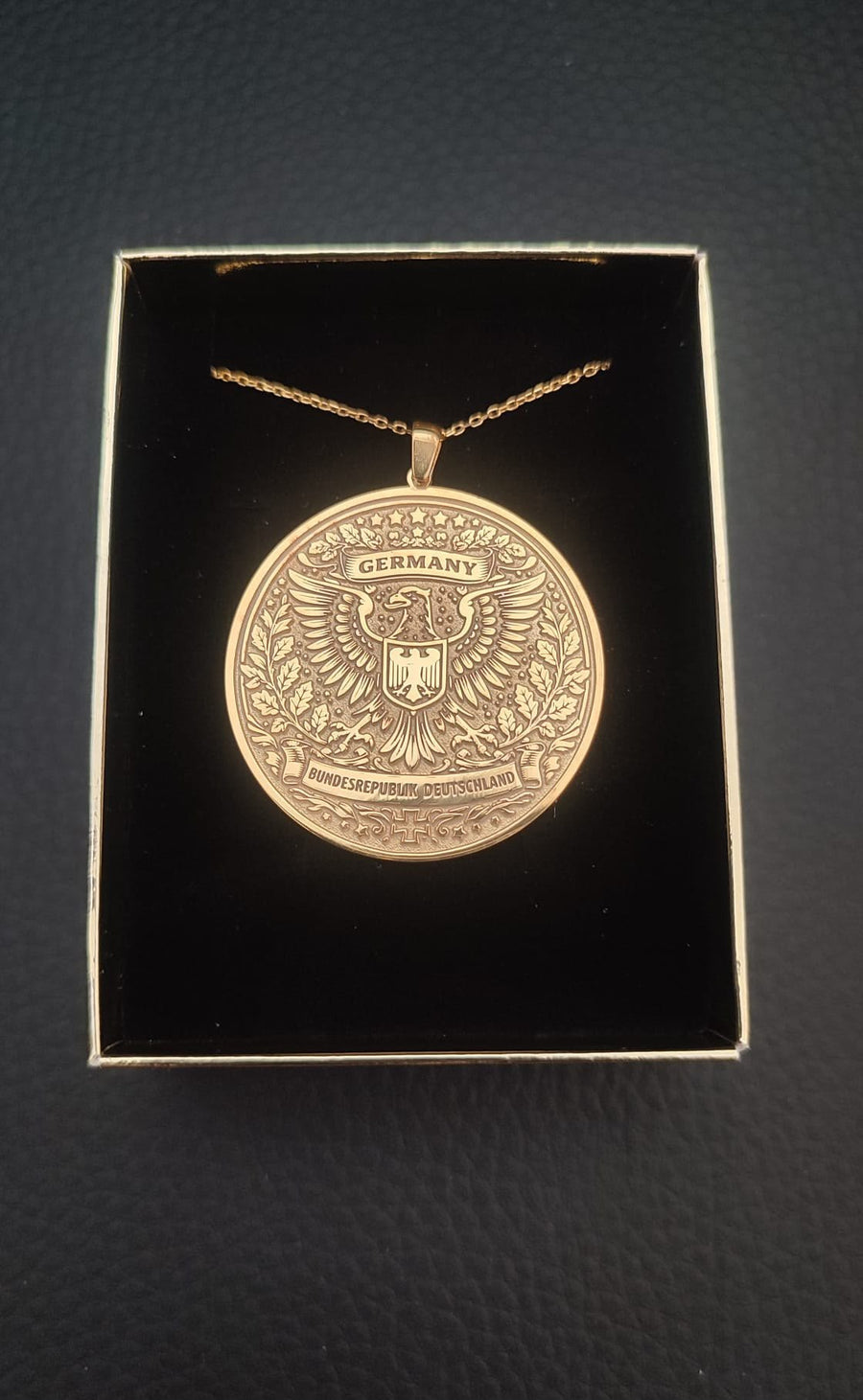 Germany coat of arms medallion in gold