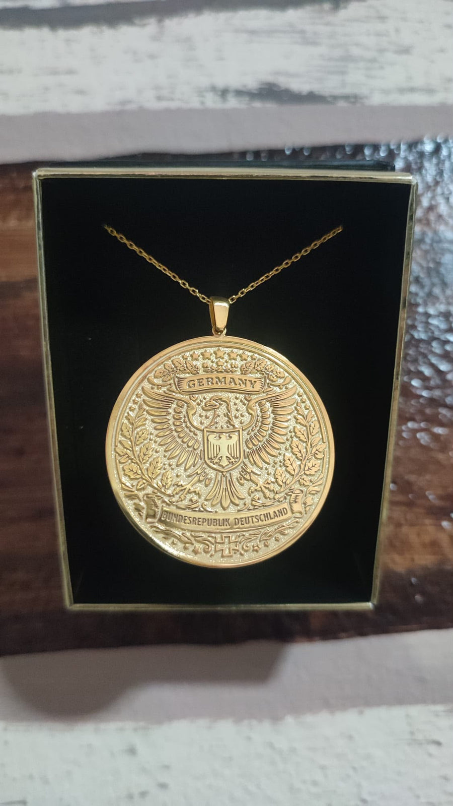 Germany coat of arms medallion in gold
