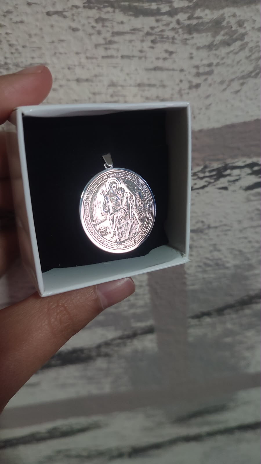 Saint and child medallion in sterling silver