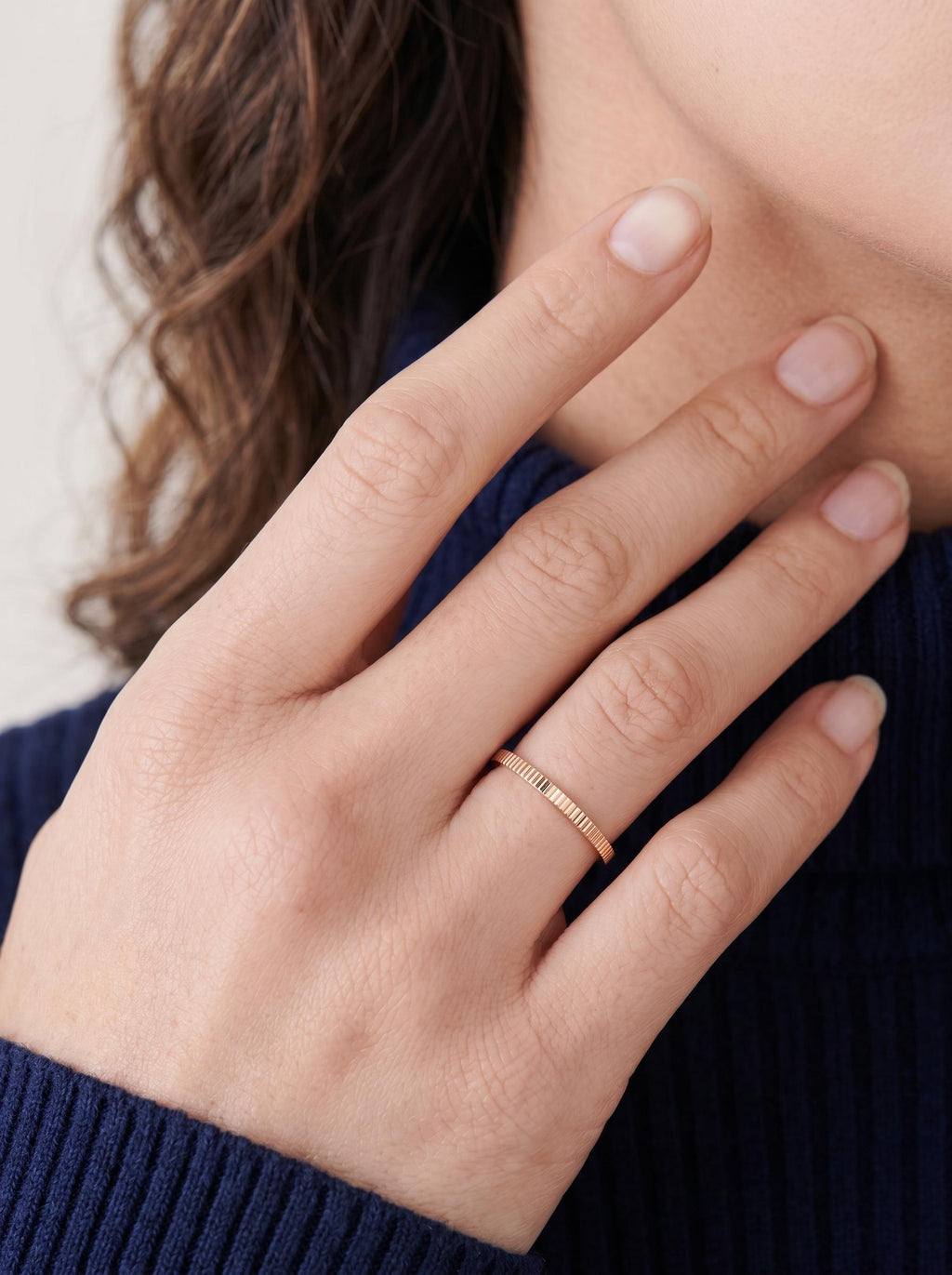 Ribbed band ring worn on the hand