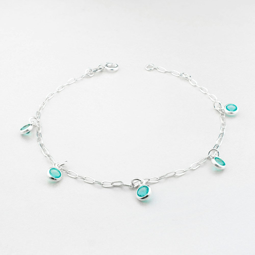 Delicate silver anklet with charms