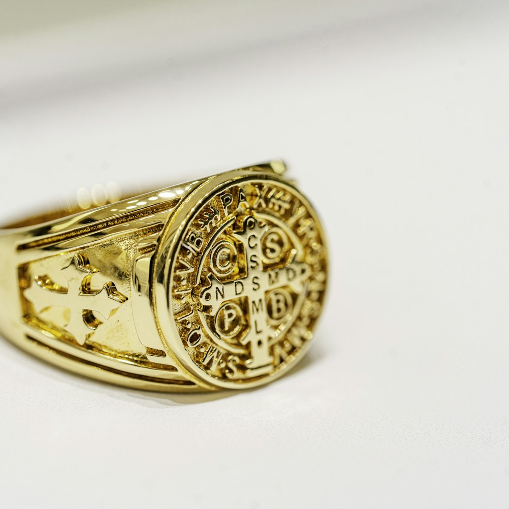 Engraved gold signet ring